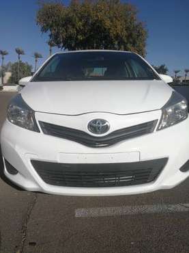 2012 TOYOTA WHITE YARIS (88991 MILES) - cars & trucks - by owner -... for sale in Phoenix, AZ