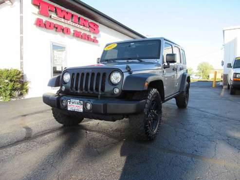 2017 Jeep Wrangler Unlimited Sport 4x4 - cars & trucks - by dealer -... for sale in Rockford, IL