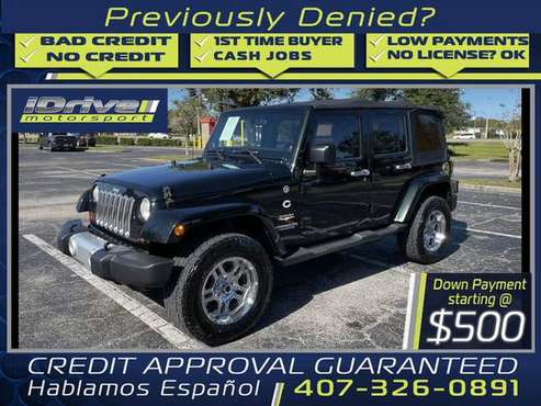 2012 Jeep Wrangler Unlimited Sahara Sport Utility 4D - cars & trucks... for sale in Orlando, FL