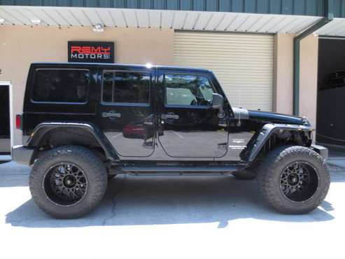 2012 Jeep Wrangler Unlimited Sahara - - by dealer for sale in Riverview, FL