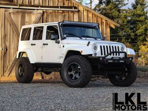 2014 Jeep Wrangler Unlimited Sahara 4x4 4dr SUV - cars & trucks - by... for sale in PUYALLUP, WA