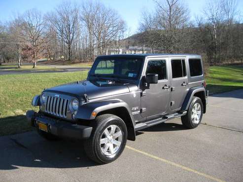 2016 Jeep Wrangler Unlimited Sahara 4x4 - cars & trucks - by owner -... for sale in Vestal, NY