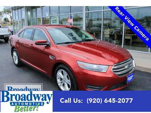 2014 Ford Taurus sedan SEL - Ford Ruby Red Metallic Tinted - cars &... for sale in Green Bay, WI