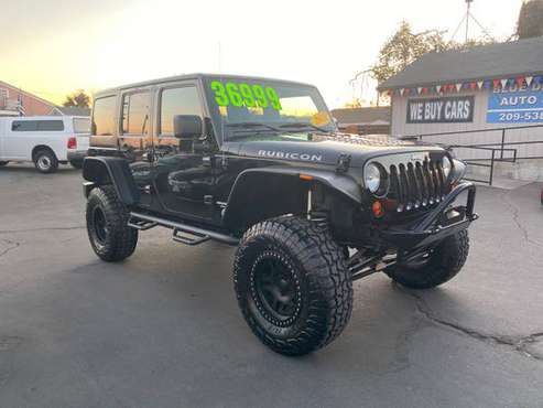 ** 2013 Jeep Wrangler Unlimited Rubicon 4x4 35k Miles Lifted HUGE... for sale in CERES, CA