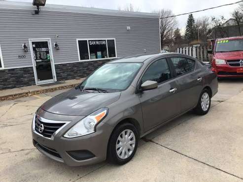 Gray 2015 Nissan Versa SV (113,000 Miles) - cars & trucks - by... for sale in Dallas Center, IA
