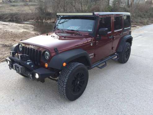 2010 Jeep Wrangler Unlimited Sport 4 door - cars & trucks - by owner... for sale in Everton, MO