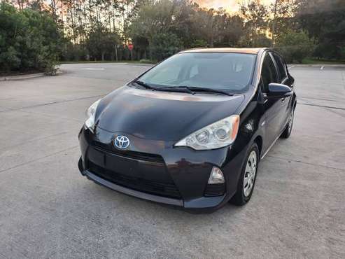 2013 Toyota Prius C Cold AC CD 50 mpg - cars & trucks - by owner -... for sale in Palm Coast, FL