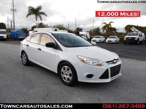 2012 Ford Focus 4-Door sedan Only 12,000 Miles! - cars & trucks - by... for sale in West Palm Beach, FL