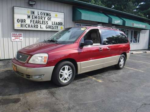 2004 FORD FREESTAR 700$ DOWN FREE TV - cars & trucks - by dealer -... for sale in Loves Park, IL