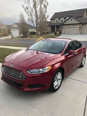 Red Ford Fusion like new - cars & trucks - by owner - vehicle... for sale in South Jordan, UT