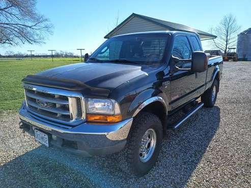 03 Ford f250 xlt diesel 4x4 - cars & trucks - by owner - vehicle... for sale in Latham, MO