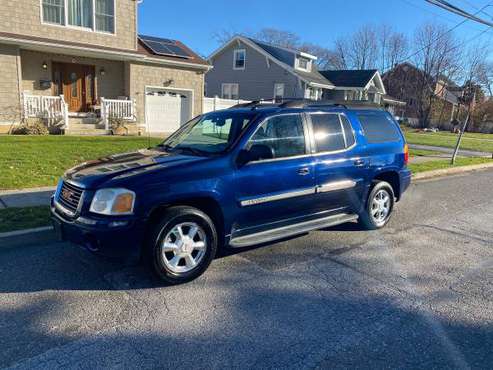 2004 GMC envoy SLT 3rd row 4x4 V6 - cars & trucks - by owner -... for sale in Bellmore, NY