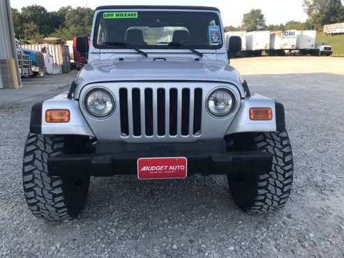 Lifted Jeep Wrangler with low miles, 6 speed for sale in Zanesville, OH