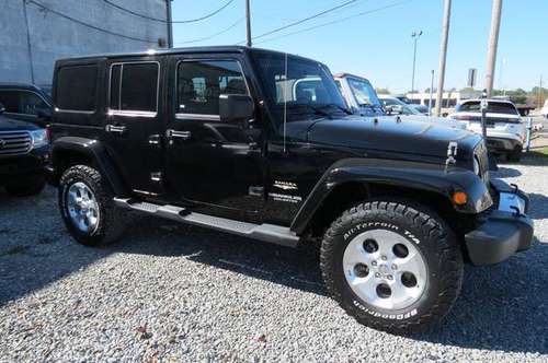 2013 Jeep Wrangler Unlimited Sahara 4x4 - cars & trucks - by dealer... for sale in Monroe, LA