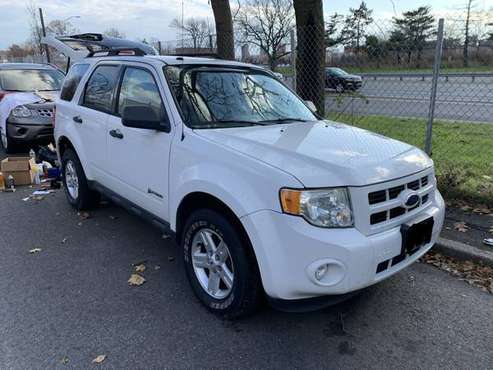 Ford Escape Hybrid AWD 69k miles - cars & trucks - by owner -... for sale in College Point, NY