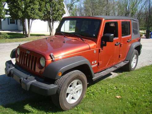 2009 Jeep Wrangler Unlimited - cars & trucks - by owner - vehicle... for sale in Oconomowoc, WI