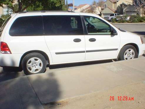 2004 Ford Freestar low miles - cars & trucks - by owner - vehicle... for sale in Palmdale, CA