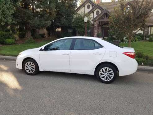 2019 Toyota Corolla 34K Miles Elderly Owned - cars & trucks - by... for sale in Fresno, CA