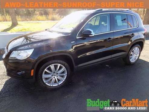 2010 Volkswagen Tiguan AWD 4dr Wolfsburg - cars & trucks - by dealer... for sale in Norton, OH