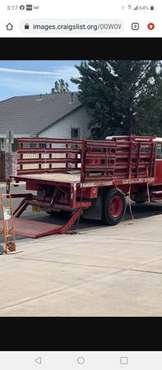 12 ft 7stake bed ONLY with lift Rust free - - by for sale in Minneapolis, MN