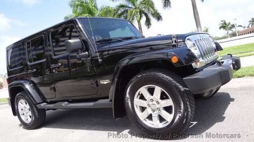 2012 *Jeep* *Wrangler Unlimited* *Sahara* Black - cars & trucks - by... for sale in West Palm Beach, FL