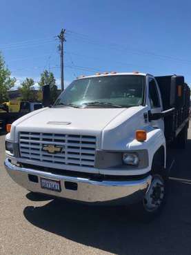 2007 Chevy C5500 flatbed truck with Stakes 20ft flatbed with lift for sale in Medford, OR