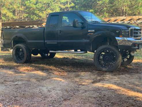 Lifted 2000 Ford F-250 7.3 diesel - cars & trucks - by owner -... for sale in Halifax, NC