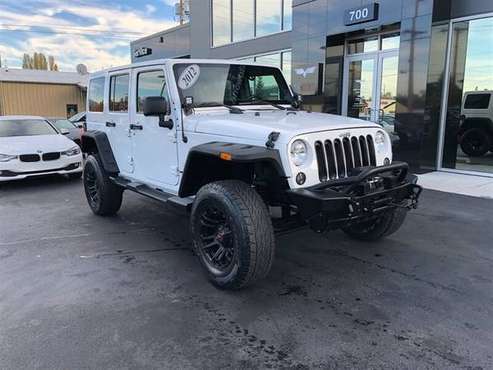 2012 Jeep Wrangler 4x4 4WD Unlimited Sahara SUV - cars & trucks - by... for sale in Bellingham, WA