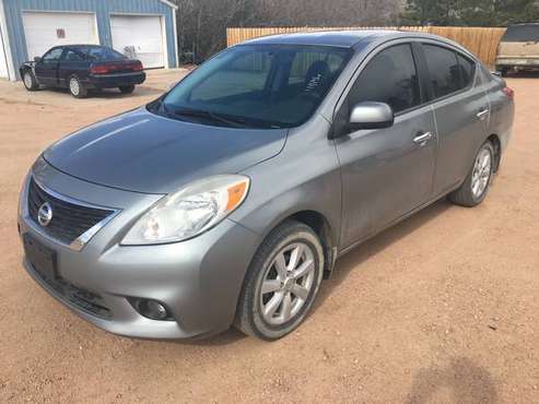 2013 Nissan Versa 4 cyl, FWD, 111k miles - - by for sale in Calhan, CO