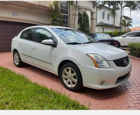 2012 White nissan Sentra - cars & trucks - by owner - vehicle... for sale in Hialeah, FL