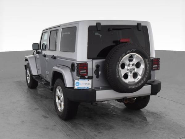 2014 Jeep Wrangler Unlimited Sahara Sport Utility 4D suv Gray - -... for sale in Lansing, MI – photo 8