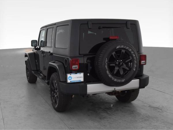 2014 Jeep Wrangler Unlimited Sahara Sport Utility 4D suv Black - -... for sale in Jacksonville, NC – photo 8
