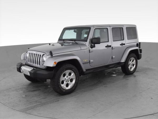 2014 Jeep Wrangler Unlimited Sahara Sport Utility 4D suv Gray - -... for sale in Lansing, MI – photo 3