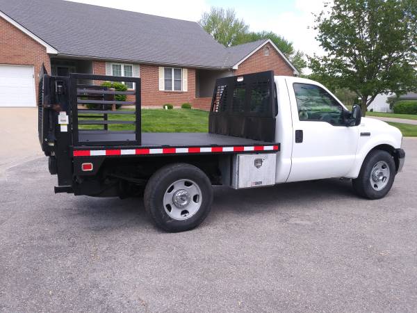 2006 FORD F350 8 STEEL FLATBED WITH TOMMY LIFT - - by for sale in Other, KS