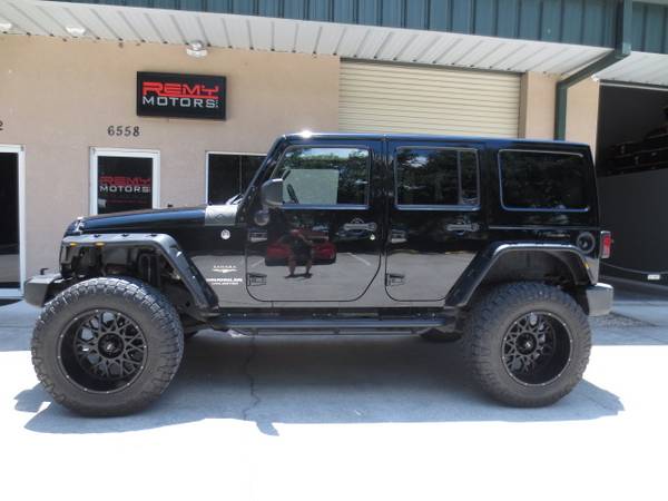 2012 Jeep Wrangler Unlimited Sahara - - by dealer for sale in Riverview, FL – photo 14