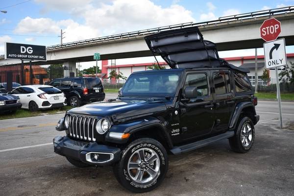 2019 Jeep Wrangler Unlimited Sahara 4x4 4dr SUV SUV - cars & trucks... for sale in Miami, CO – photo 9