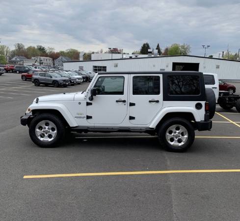 2015 JEEP WRANGLER UNLIMI SAHARA - - by dealer for sale in Akron, OH – photo 4