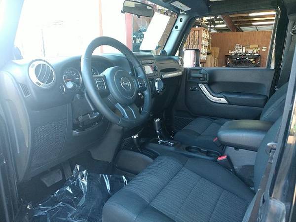 2012 Jeep Wrangler Sahara 4WD - cars & trucks - by dealer - vehicle... for sale in Cleveland, AL – photo 9