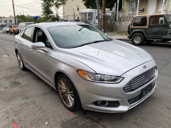 2014 Ford Fusion SE - cars & trucks - by owner - vehicle automotive... for sale in Bronx, NY – photo 4