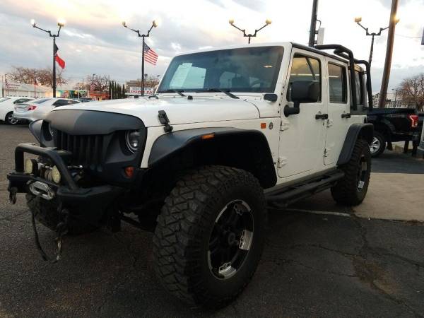 2010 Jeep Wrangler Unlimited Sahara 4x4 4dr SUV - - by for sale in Arlington, TX – photo 10
