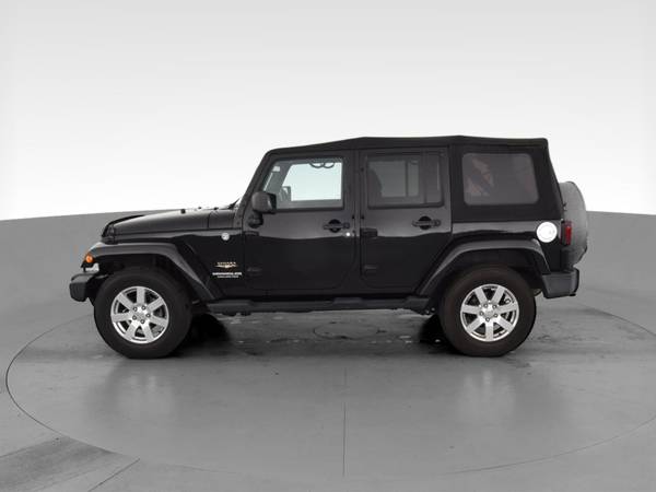 2013 Jeep Wrangler Unlimited Sahara Sport Utility 4D suv Black - -... for sale in Janesville, WI – photo 5