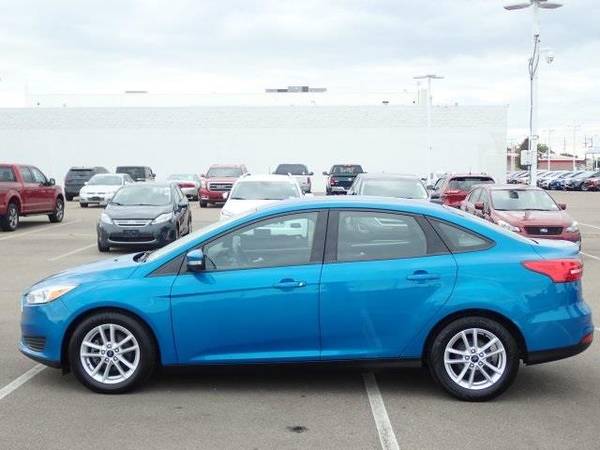 2016 Ford Focus sedan SE (Blue Candy Metallic Tinted for sale in Sterling Heights, MI – photo 5