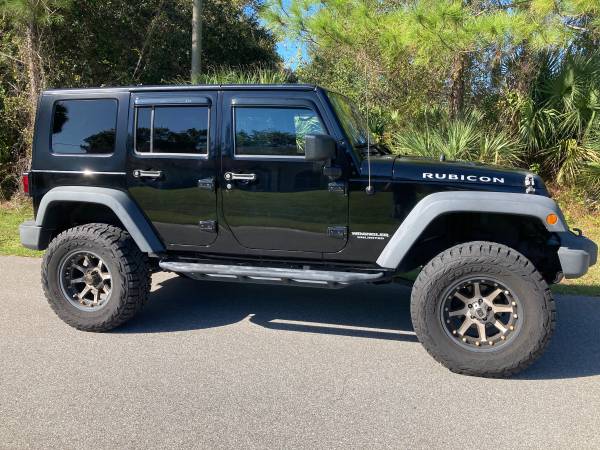 2009 Jeep Wrangler 4WD Rubicon Unlimited - cars & trucks - by owner... for sale in North Port, FL – photo 4