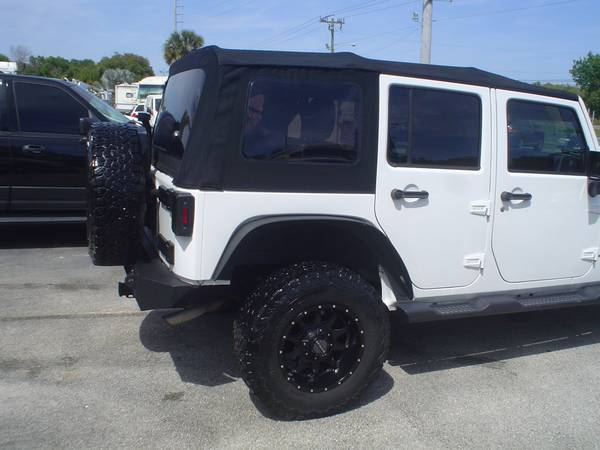 14 Florida Jeep wrangler nds rebuilt fixer 74kk new top - cars & for sale in Merritt Island, FL – photo 4