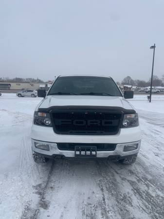 Ford F-150 Lariat 4X4Leather Sunroof heated seats White on Black for sale in Osseo, MN – photo 2