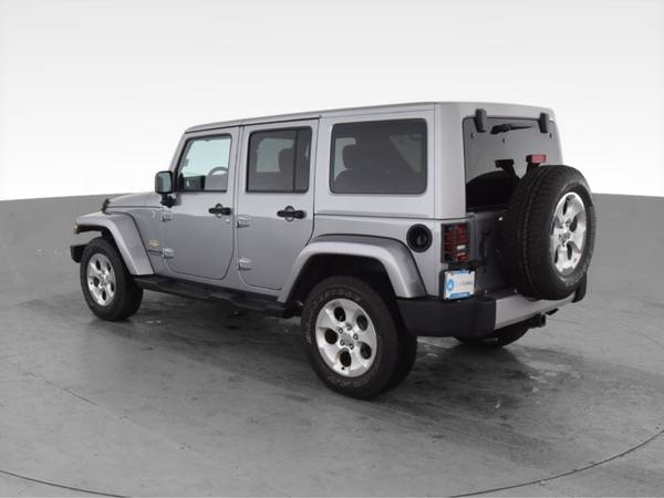 2014 Jeep Wrangler Unlimited Sahara Sport Utility 4D suv Gray - -... for sale in Lansing, MI – photo 7