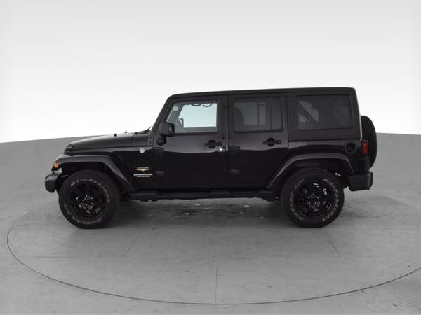 2014 Jeep Wrangler Unlimited Sahara Sport Utility 4D suv Black - -... for sale in Jacksonville, NC – photo 5