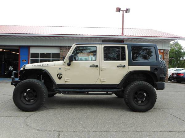 ★★★ 2011 Jeep Wrangler Unlimited 4x4 / Lifted with Wheels! ★★★ -... for sale in Grand Forks, ND