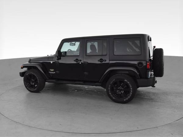 2014 Jeep Wrangler Unlimited Sahara Sport Utility 4D suv Black - -... for sale in Jacksonville, NC – photo 6