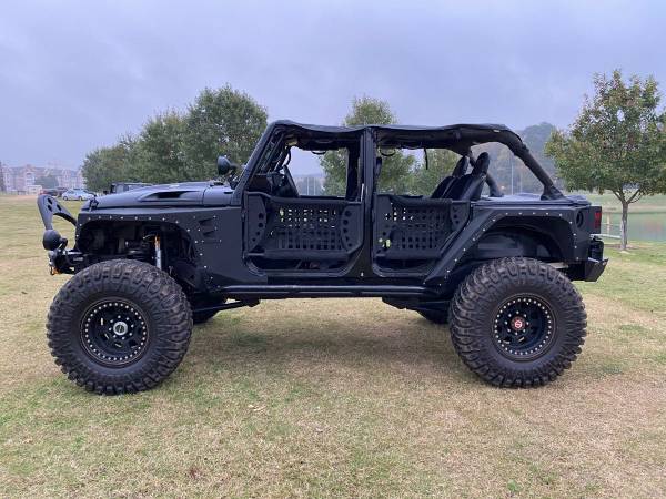 LOW MILE SUPERCHARGED Jeep Wrangler Sahara - cars & trucks - by... for sale in Auburn, AL – photo 2